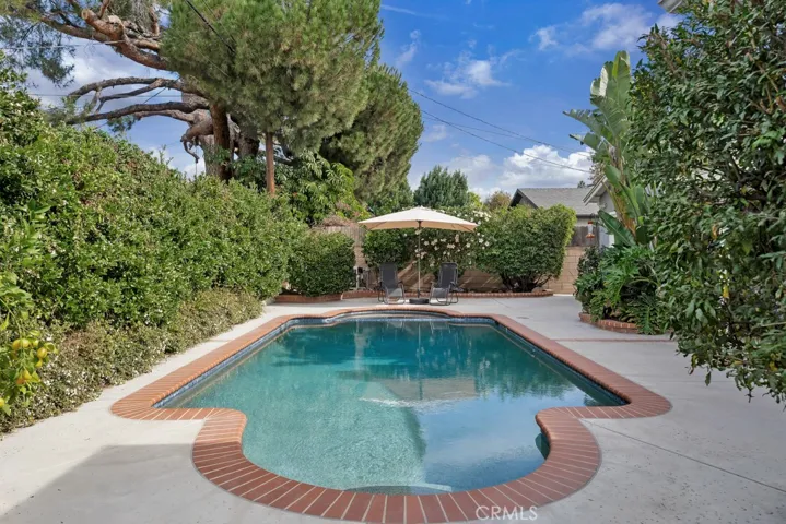 Entertainer’s Back Yard
Private paradise
Sparkling in-ground pool & spa
Resurfaced (2019)
Mini pebble-bottom
New heating and filter equipment (2019)
LED color changing lights 
Newer brick coping and tile
Covered patio
BBQ area on side yard
Mature fruit trees (lemon, orange, nectarine & pomegranate)
Bubblers and drip system on timer
Block wall fencing