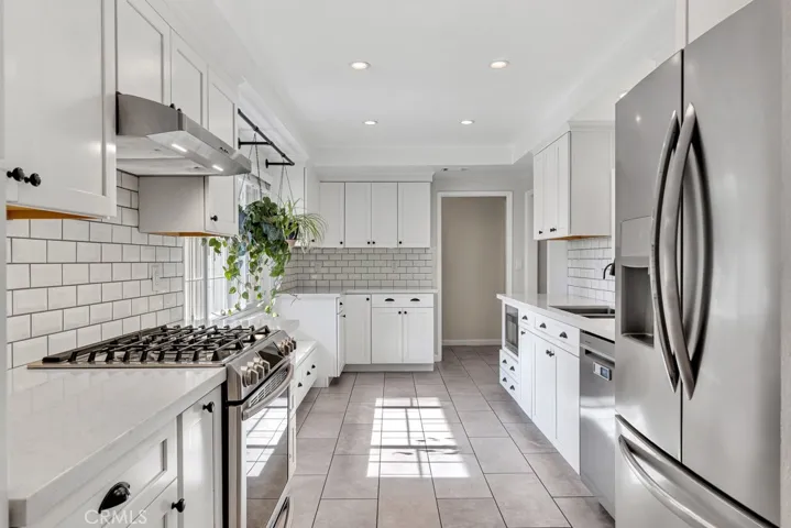 Remodeled Kitchen (2018)
Sparkling window
Custom sunlit window bench with integrated storage
LED recessed lights
White shaker cabinetry
Matte black hardware & fixtures
Soft self-closing doors & drawers
Corner double layer Lazy Susan appliance storage
Pull-out spice cabinet
Pull-out cooking sheet cabinet
Gourmet pantry
Quartz countertops
Subway tiled backsplash
Stainless steel under mount dual basin
Moen® faucet 
Energy Star Appliances
Samsung® stainless steel gas/convection range with gri...