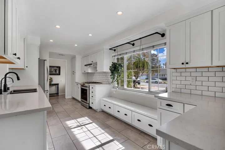 Remodeled Kitchen (2018)
Sparkling window
Custom sunlit window bench with integrated storage
LED recessed lights
White shaker cabinetry
Matte black hardware & fixtures
Soft self-closing doors & drawers
Corner double layer Lazy Susan appliance storage
Pull-out spice cabinet
Pull-out cooking sheet cabinet
Gourmet pantry
Quartz countertops
Subway tiled backsplash
Stainless steel under mount dual basin
Moen® faucet 
Energy Star Appliances
Samsung® stainless steel gas/convection range with gri...