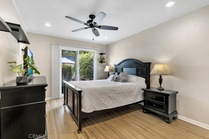 Primary Bedroom
Smooth ceilings
Crown molding
Ceiling fan
LED recessed lights
Closet with organizers
Sliding glass door leading to the backyard
Rich hardwood floors