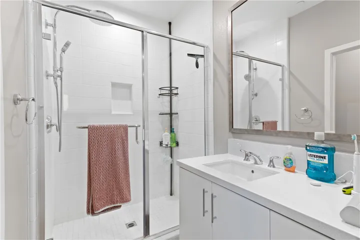 Spa inspired primary bathroom with modern finishes