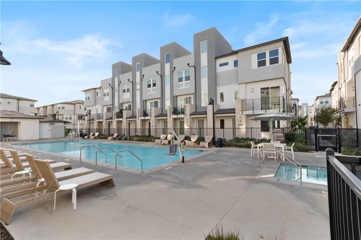 Community pool and spa steps from your door