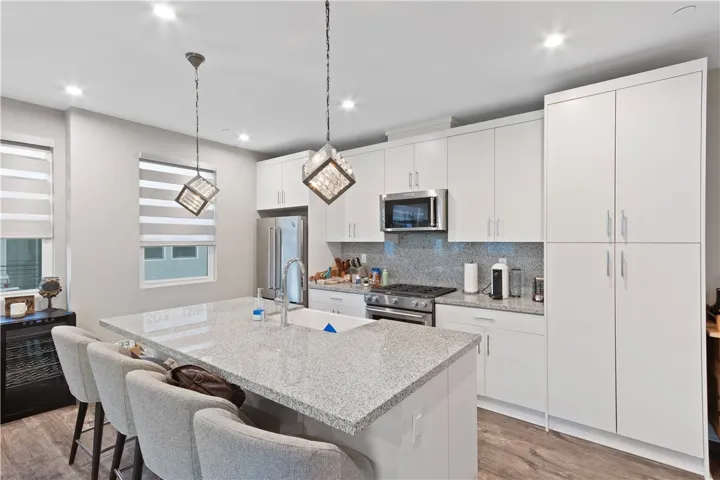 Chef ready kitchen with premium appliances and farmhouse sink