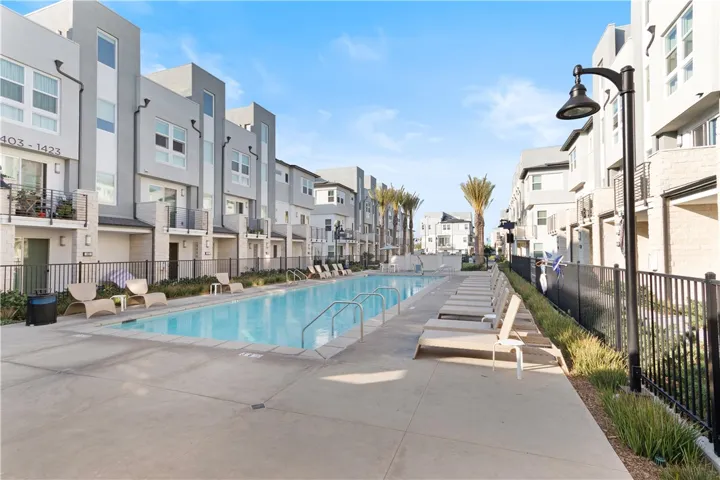 Community pool and spa steps from your door