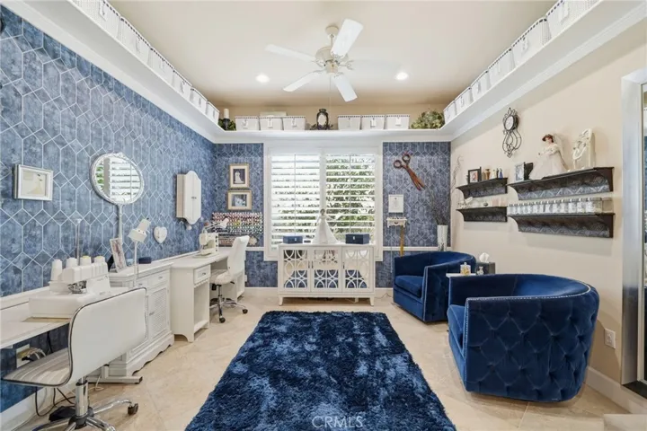 Formal Dining Room is Currently Used as a Bonus Sewing Room - Check out the Overhead Built-In Shelving
