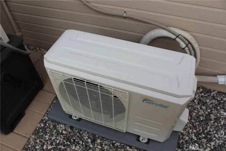 Garage mini split condenser unit