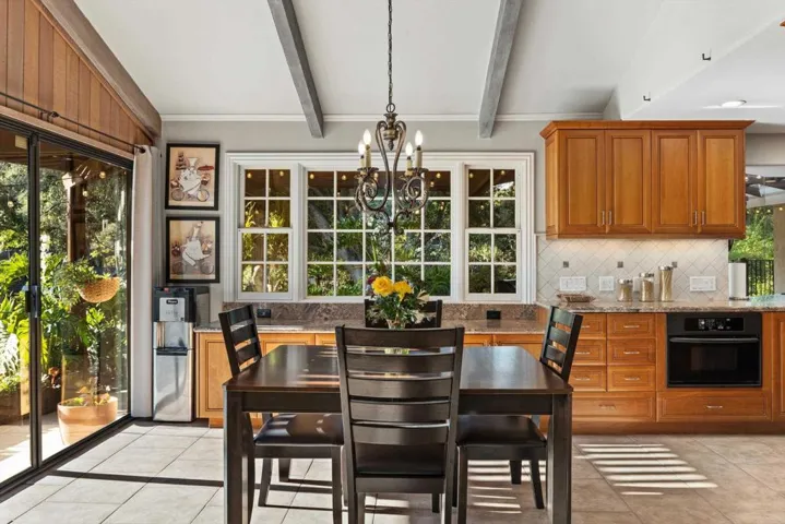 Lots of natural light from the sliding glass doors. Built in microwave in lower cabinet.