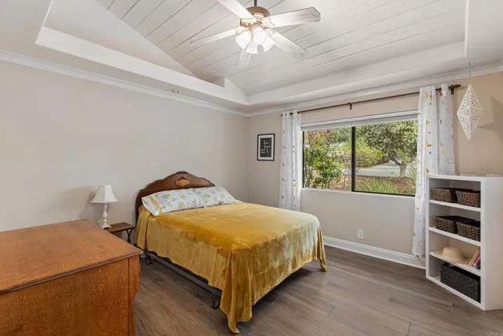 Open beam ceilings with dropped soffit w/recessed lighting - faces the front of the house