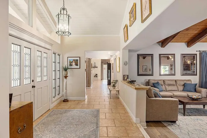 Lets go through to the Dining Room, Kitchen and Family Room