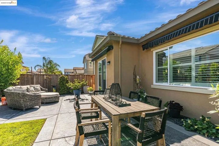 View of patio with an outdoor living space and outdoor dining space