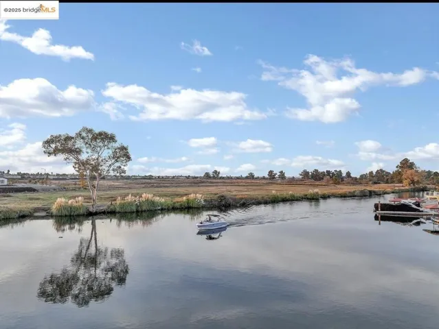 Water view featuring a dock