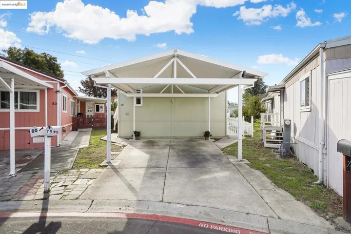 View of front facade with concrete driveway
