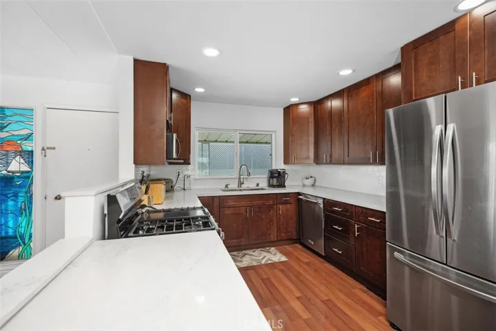Kitchen opens up to dining room and living room