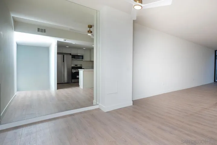 DINING AREA OPPOSITE REMODELLED KITCHEN