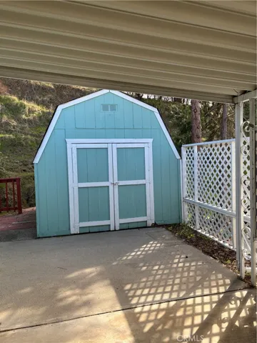 Storage shed at back of the carport.  There are 2 storage sheds.