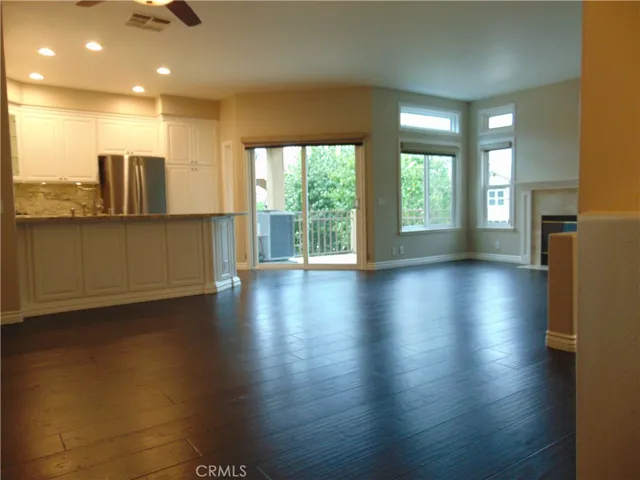 End unit Carriage design on one level with interior stairs and ground level secluded entrance