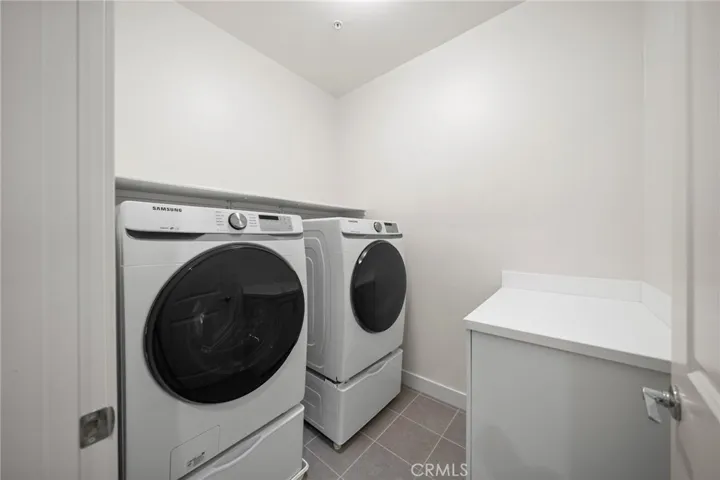 Upstairs Laundry Room with washer and dryer