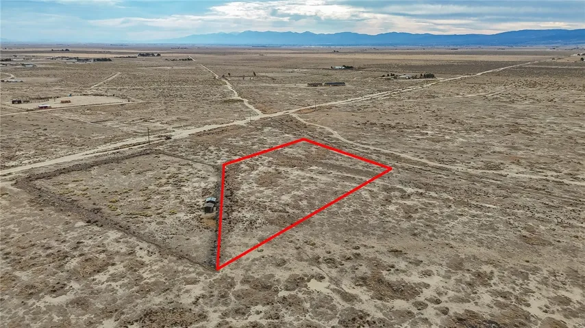 Lot 32 looking from north to south.  80th St W to the left and Antelope Hwy / Avenue A8 to the right