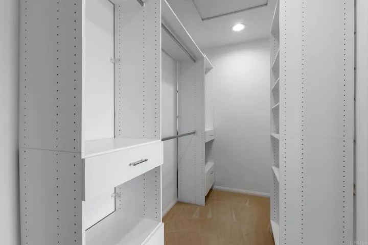 PRIMARY BEDROOM CLOSET