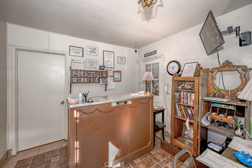 Registration desk with door to managers residence