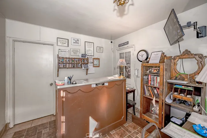 Registration desk with door to managers residence