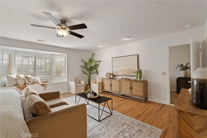 Spacious primary bedroom with room for multiple sitting areas