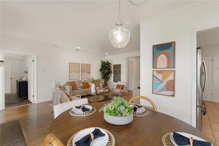 View from dining area into living area/kitchen