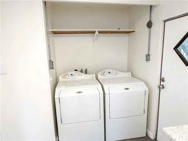 Laundry Area Includes Full-Size Washer and Dryer