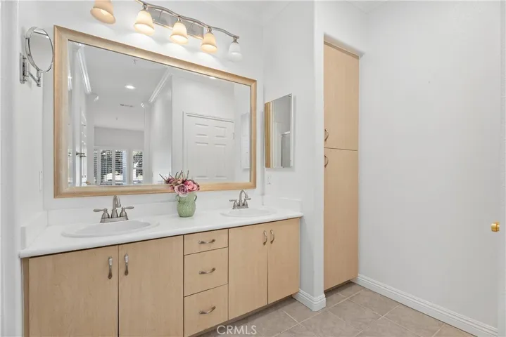 The primary suite has a dual vanity and ample storage.