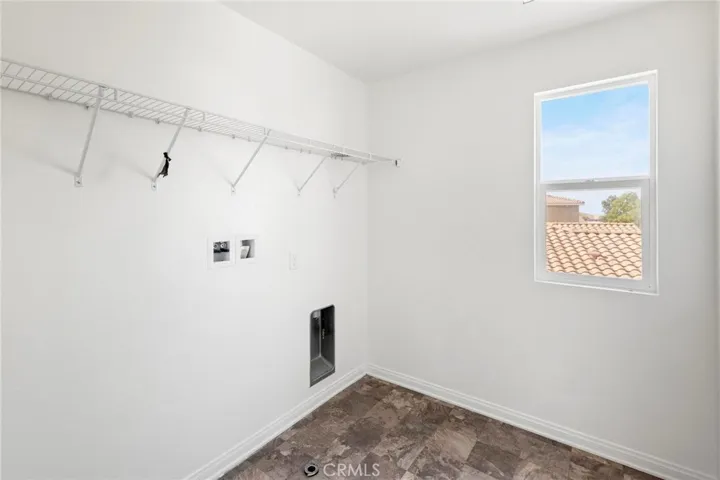 Laundry Room located upstairs.
