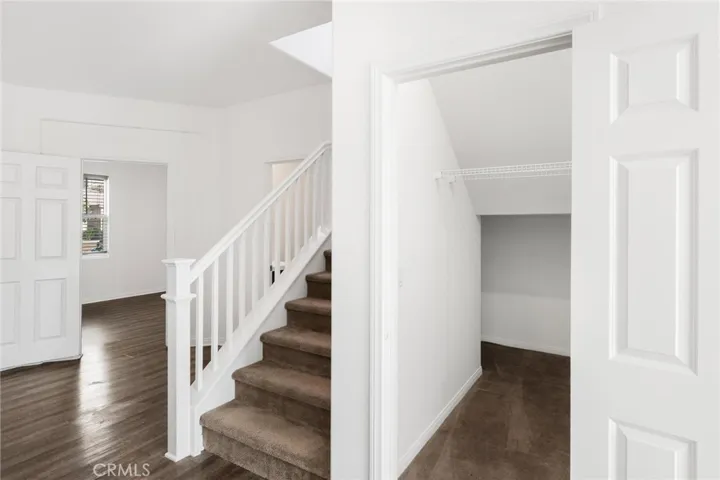 Storage under the stairs.