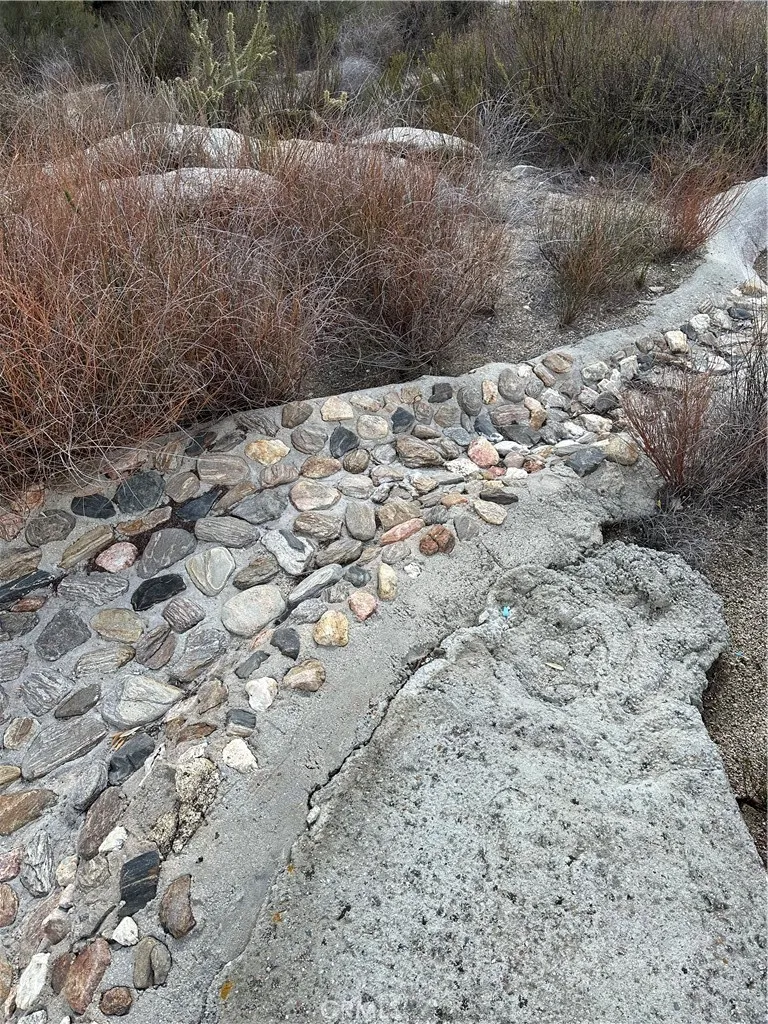 Rock around pool.