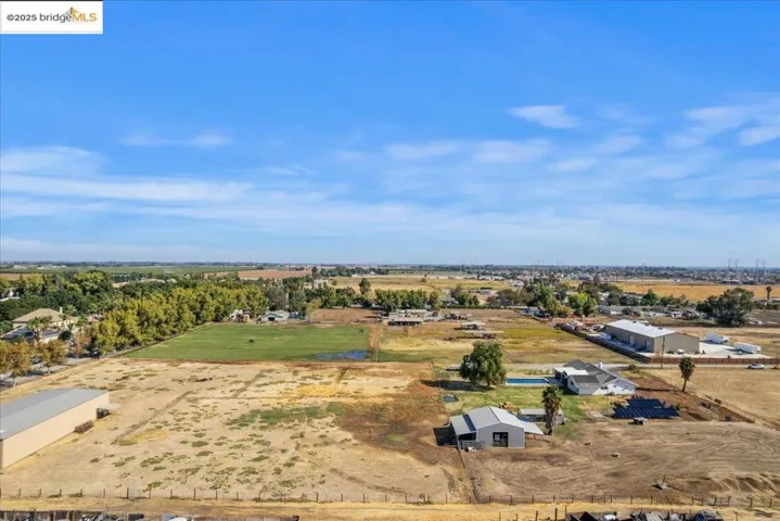 Overview of rural landscape with a nearby body of water