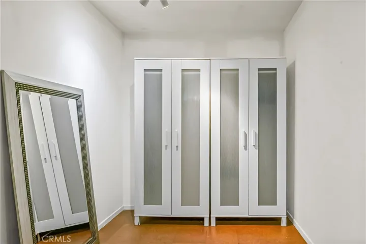 2 armoires in primary bedroom