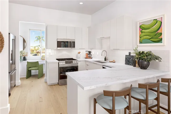 Kitchen - Images shown are artist renderings and not actual unit. Final finishes may vary.