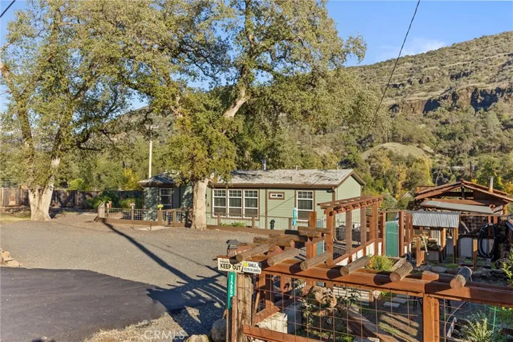 Home, Cabin, Shop and Fenced Garden with Front & Rear Bluff Views
