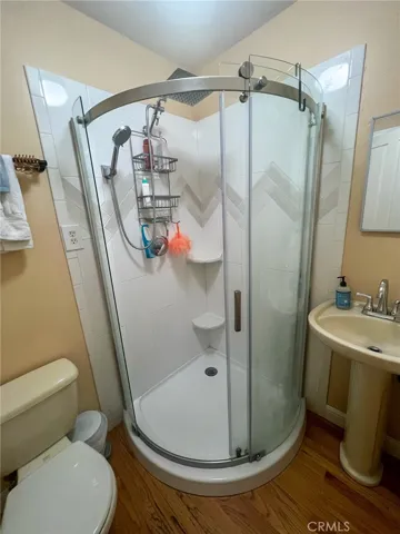 Former powder room now a 3/4 bath.