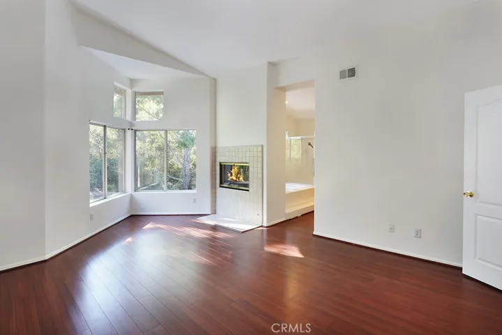 Primary suite with dual sided fireplace