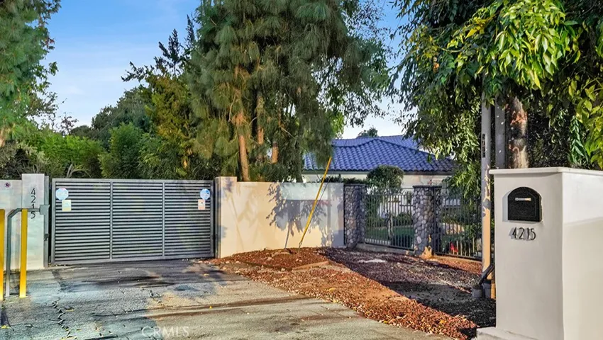 Newer Gate with Code to enter Property.