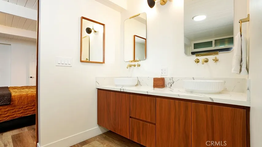 Sinks and Cabinets in Master Bathroom.