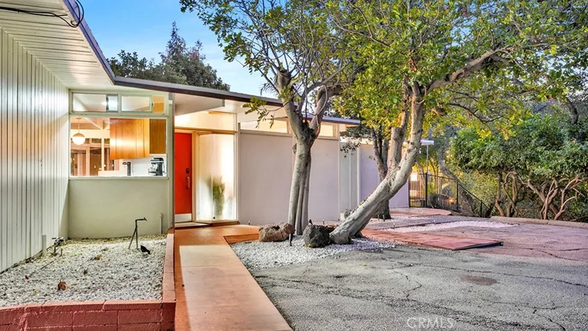 Front of house - right side, looks into kitchen.