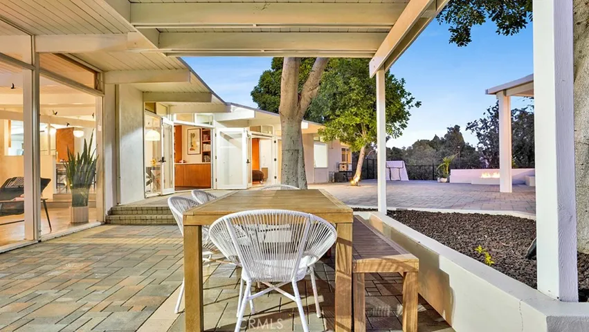 Side of House under Patio Cover looking towards some of the Views that the Backyard has.