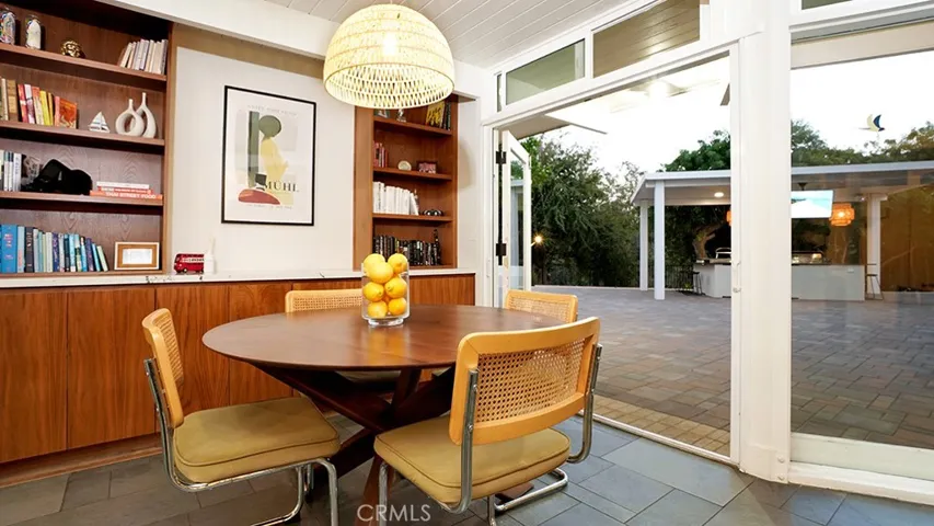 Seating off the kitchen. Built in Cabinets and Shelves.