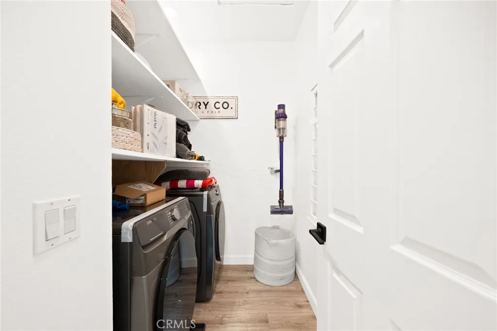 Dedicated laundry room with added storage and functionality