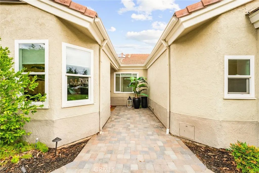 Private side entrance leading to front door