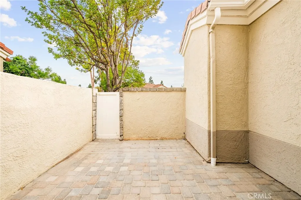 Private walk-out patio off the primary suite