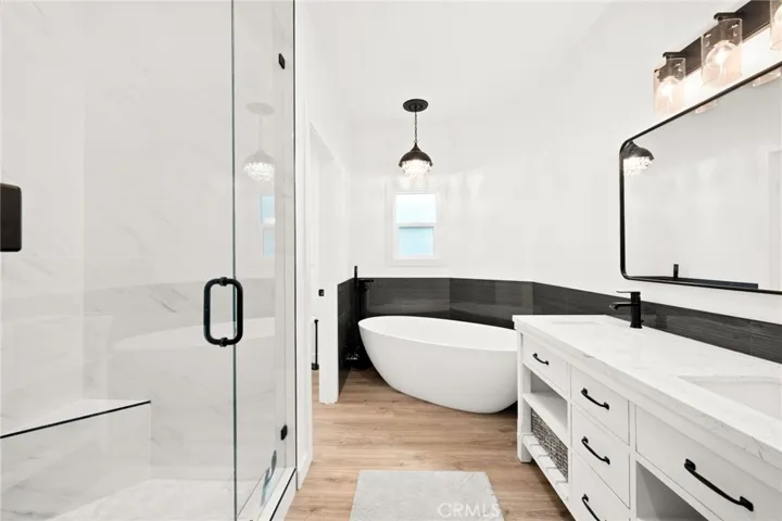 Dual vanity with ample storage and modern styling