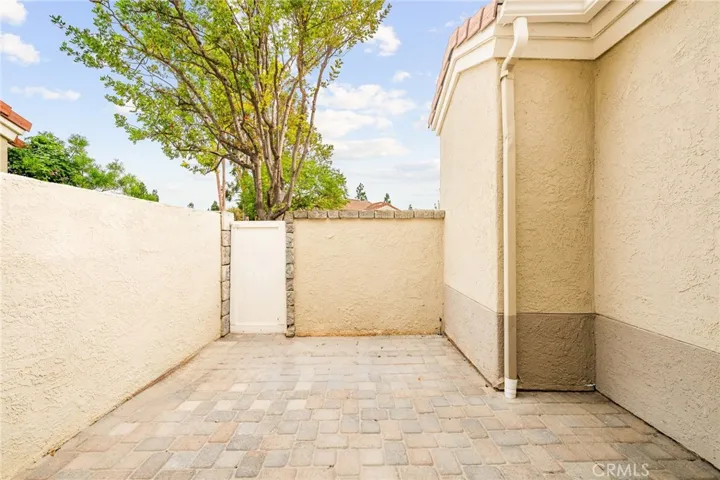 Private walk-out patio off the primary suite