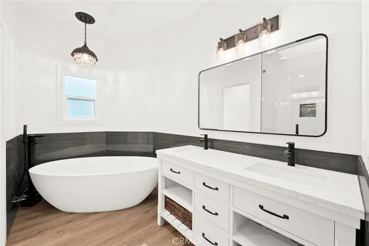 Spa-inspired bath with soaking tub and designer finishes