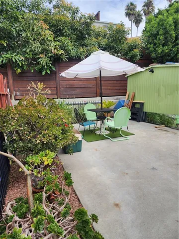 Private patio area in backyard